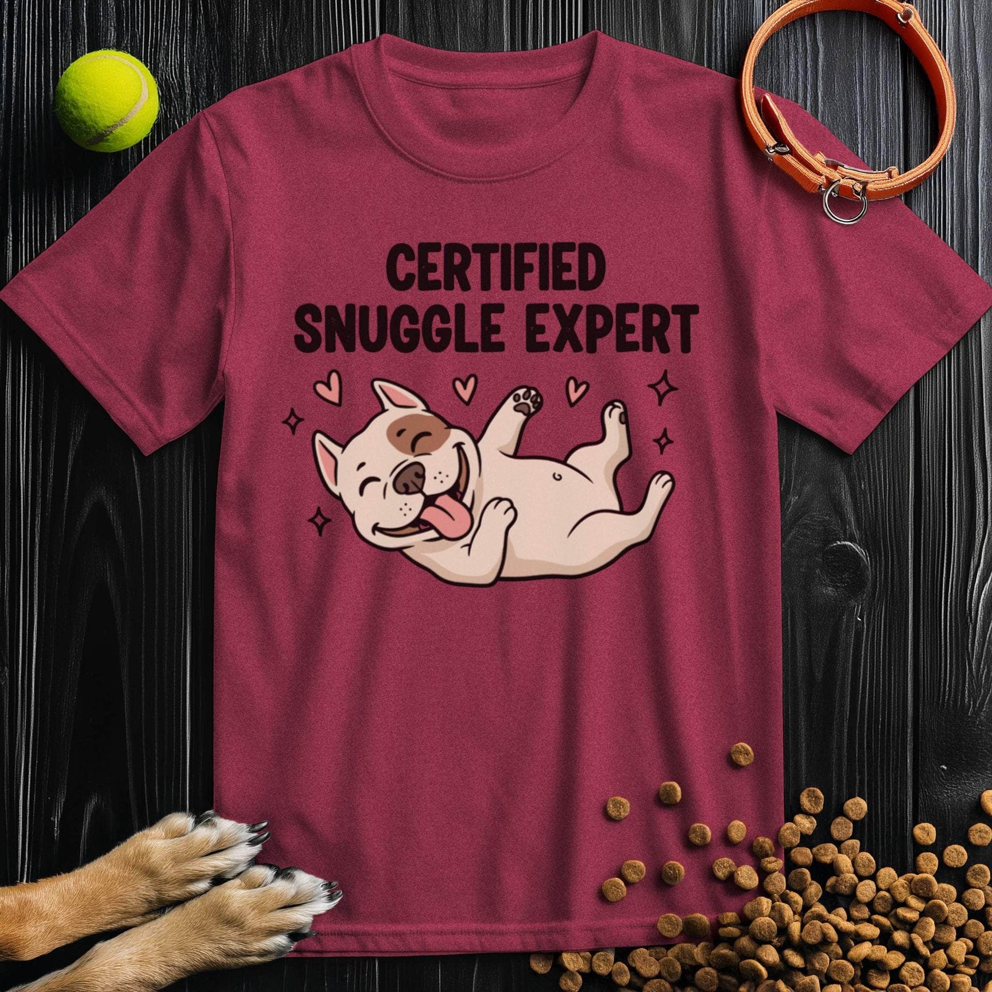 Maroon Certified Snuggle Expert T-Shirt featuring a joyful dog graphic, perfect for fans of cozy, cotton Dog Graphic Tees.