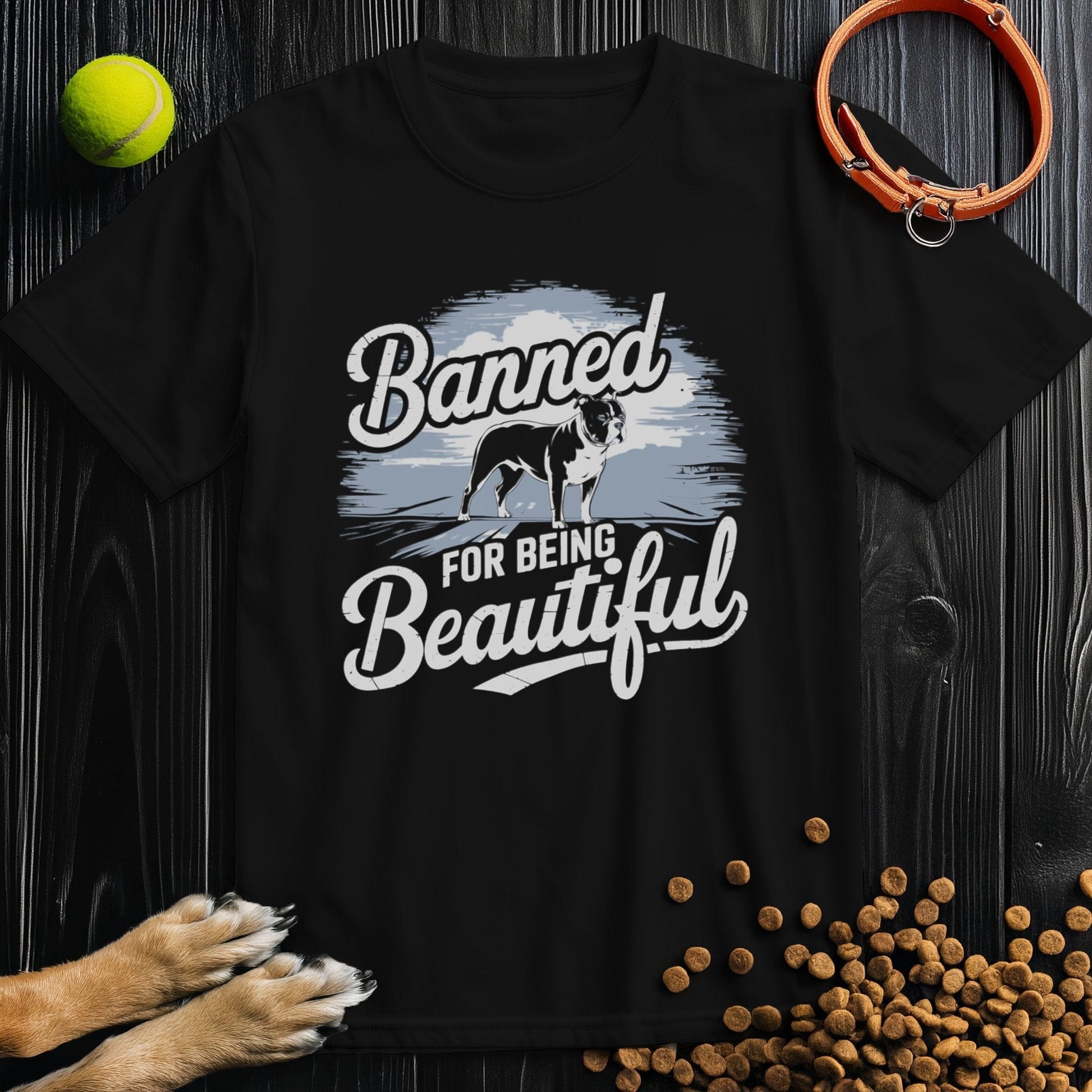 Black Banned & Beautiful Pitbull T-Shirt in ethical cotton with bold white text and pitbull graphic, unisex crew fit for casual wear.