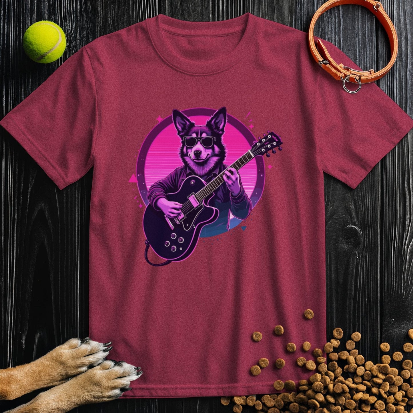 Maroon dog lover shirt with bold synthwave design of a dog playing guitar. Retro-inspired cotton tee perfect for music and pet fans.