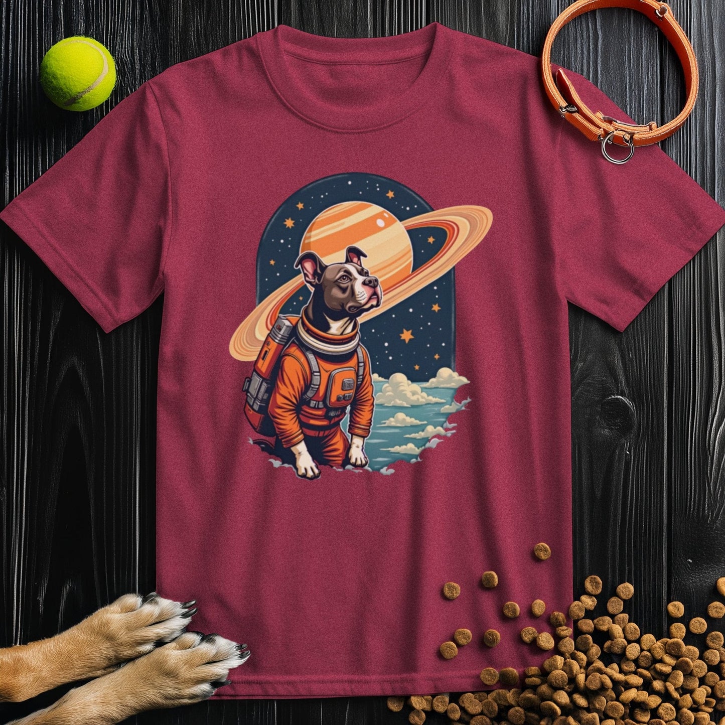 Maroon Cosmic Canine Shirt with a space dog and Saturn illustration. A standout dog lover tee with comfort and personality.