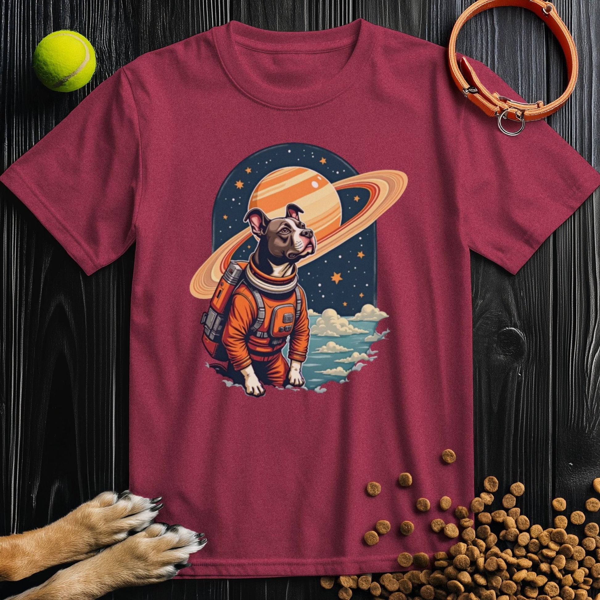 Maroon Cosmic Canine Shirt with a space dog and Saturn illustration. A standout dog lover tee with comfort and personality.