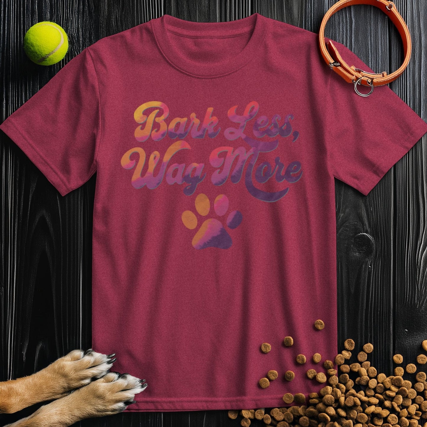 Dog Lover Shirt - Bark Less, Wag More in maroon, 100% cotton T-shirt with colorful typography and paw print, great gift for dog lovers.