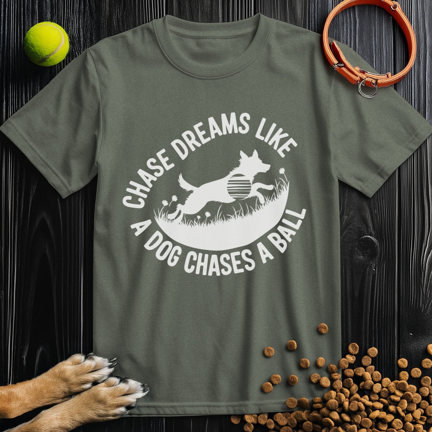 Olive green Chase Dreams T-Shirt with dog and ball print. Ethically made cotton tee for versatile, relaxed fashion.