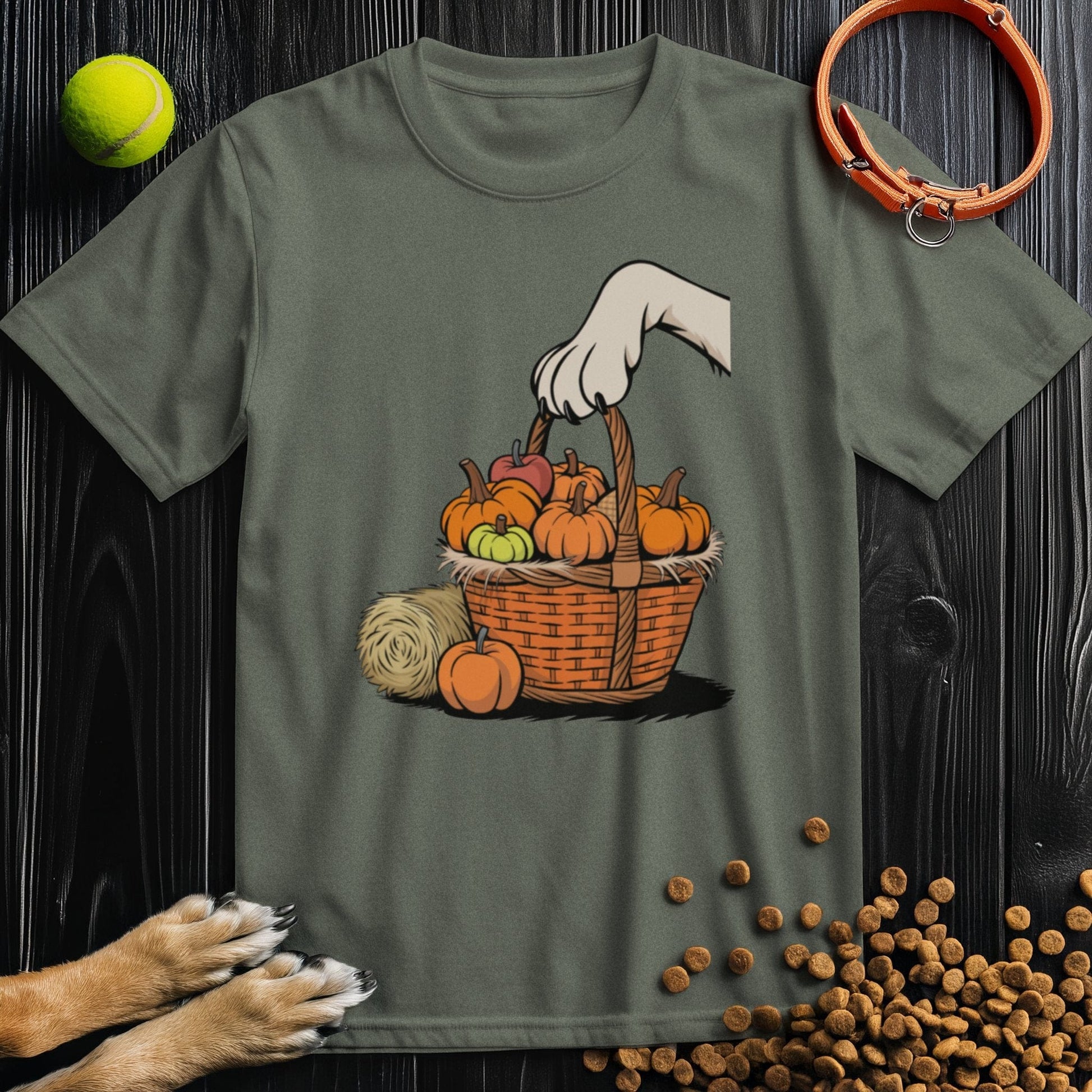 Olive green dog-themed T-shirt with fall basket and paw graphic. Ethically made from US cotton for comfort and durability.