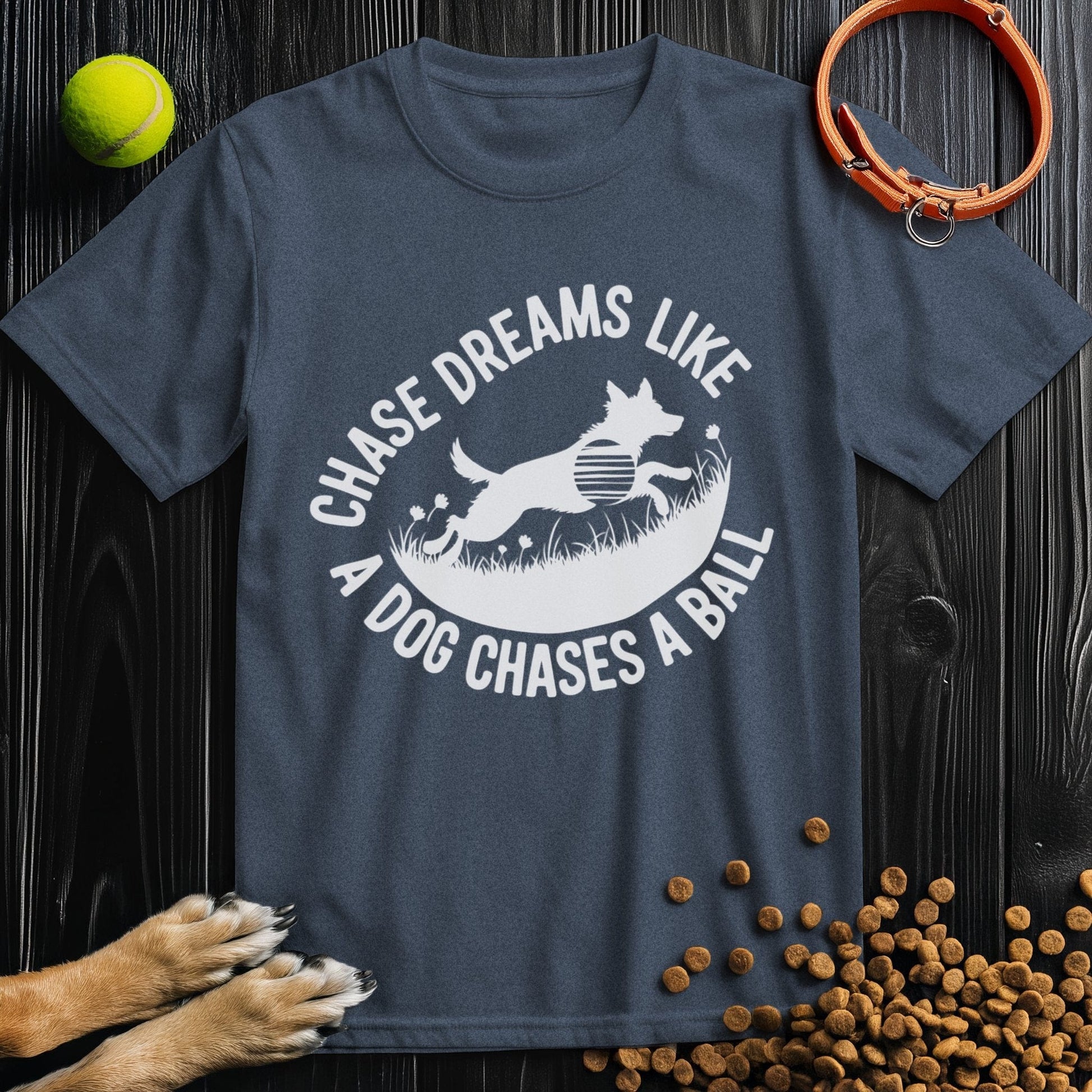 Navy blue Chase Dreams T-Shirt with dog chasing ball design. Soft cotton tee perfect for dog lovers and everyday comfort.