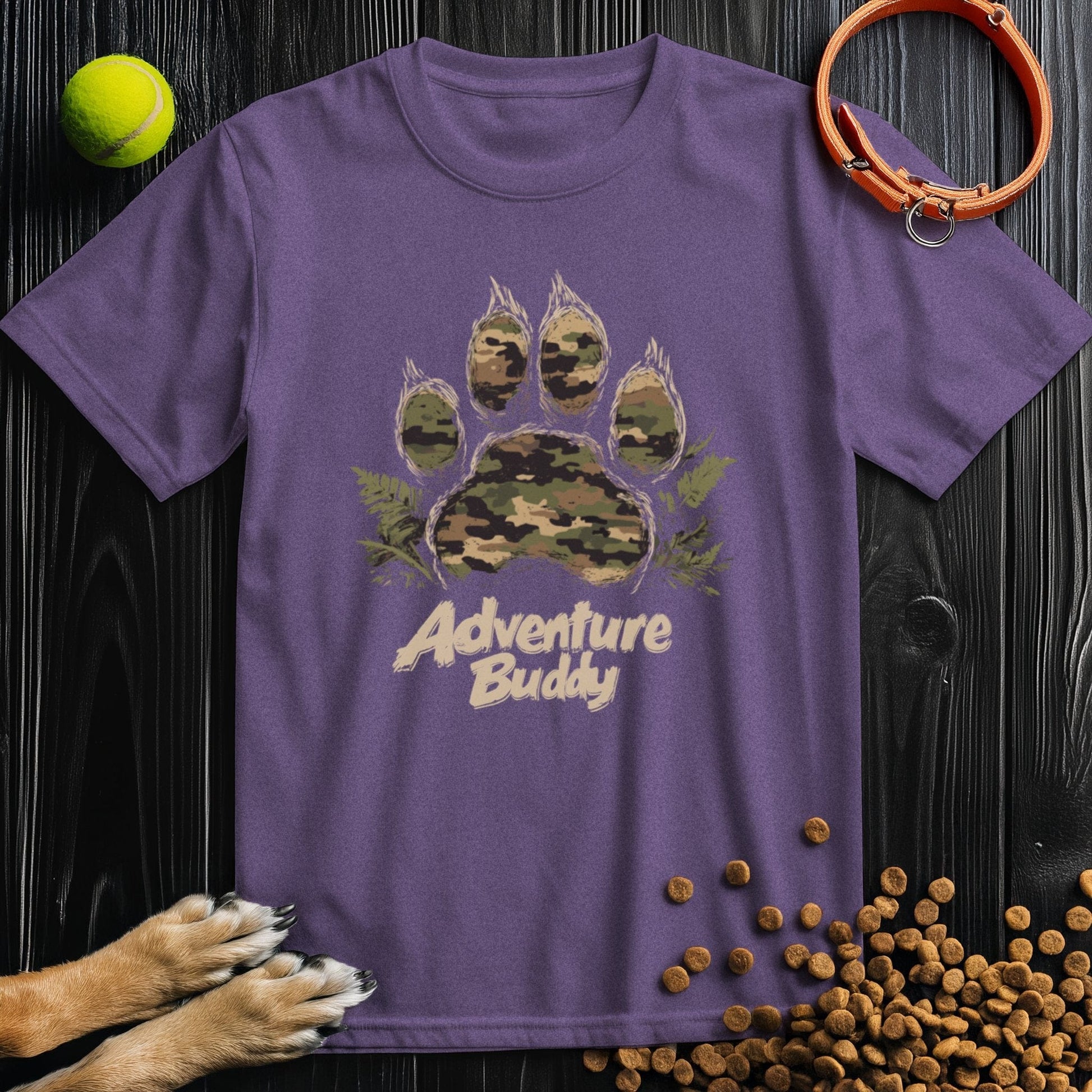 Purple Camo Paw Adventure T-Shirt with camo paw graphic and 'Adventure Buddy' lettering, comfortable cotton crew neck for dog fans.