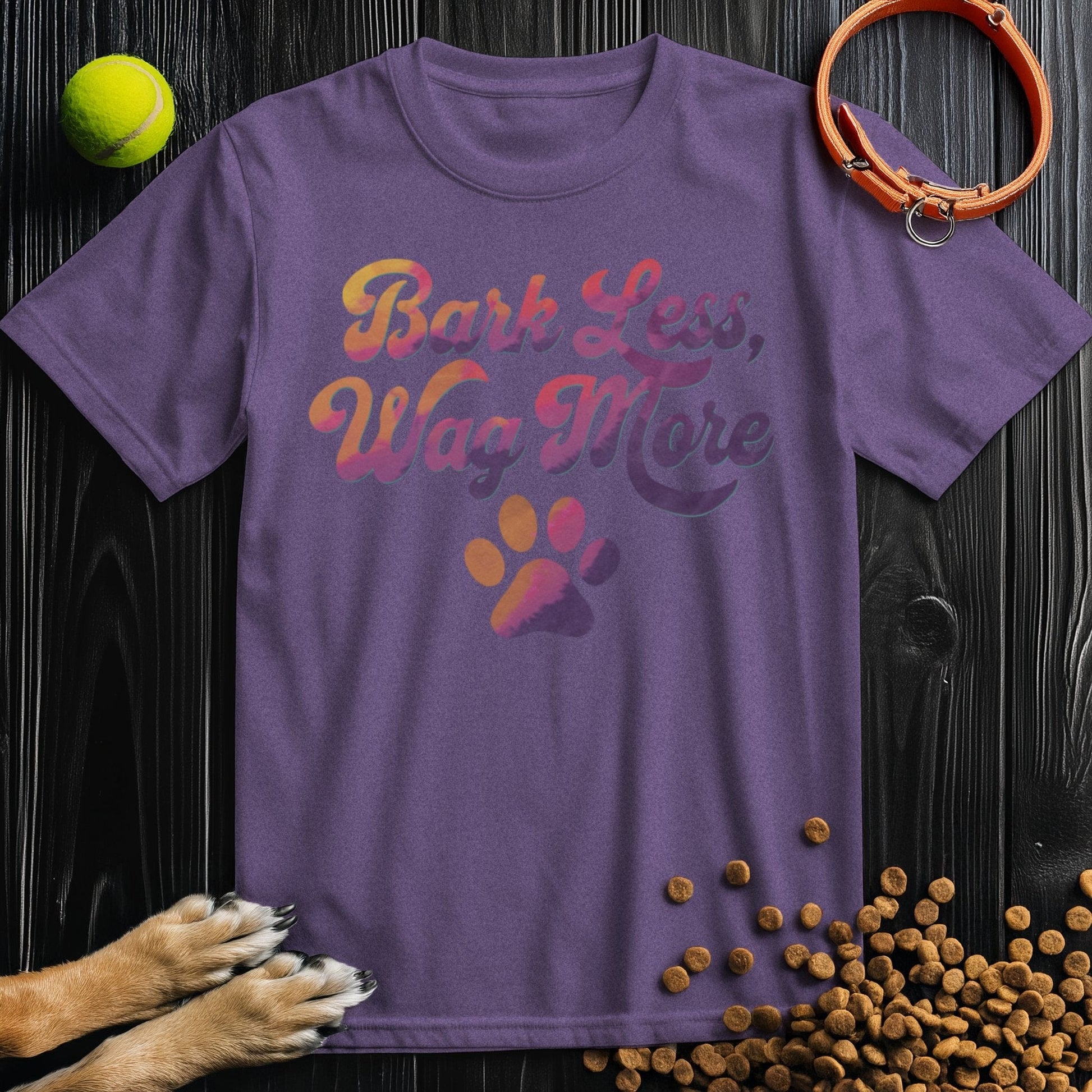 Dog Lover Shirt - Bark Less, Wag More in purple, unisex cotton tee with colorful text and paw design, ideal for dog owners and casual wear.