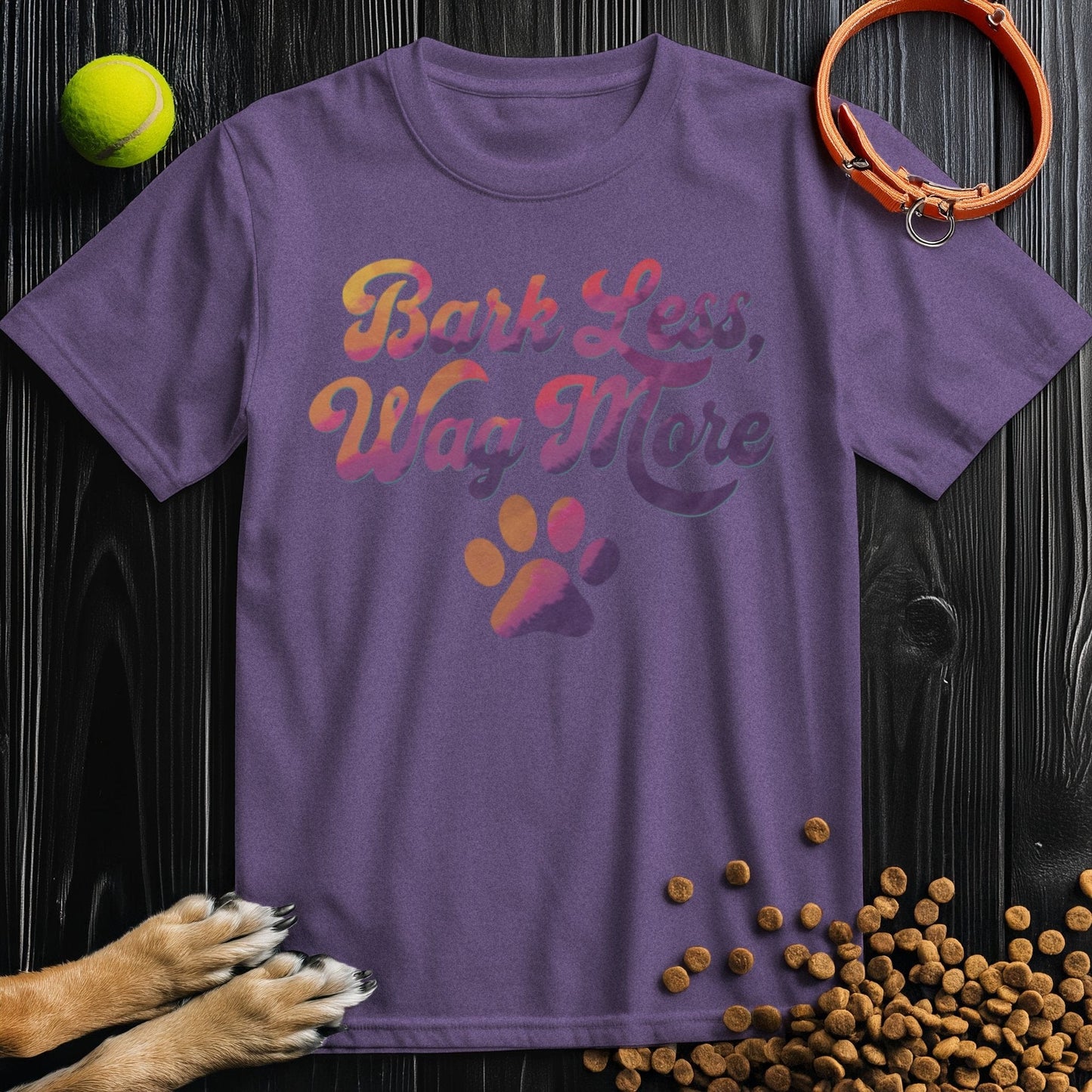 Dog Lover Shirt - Bark Less, Wag More in dark purple, regular fit unisex T-shirt with colorful message and paw print, perfect for summer.