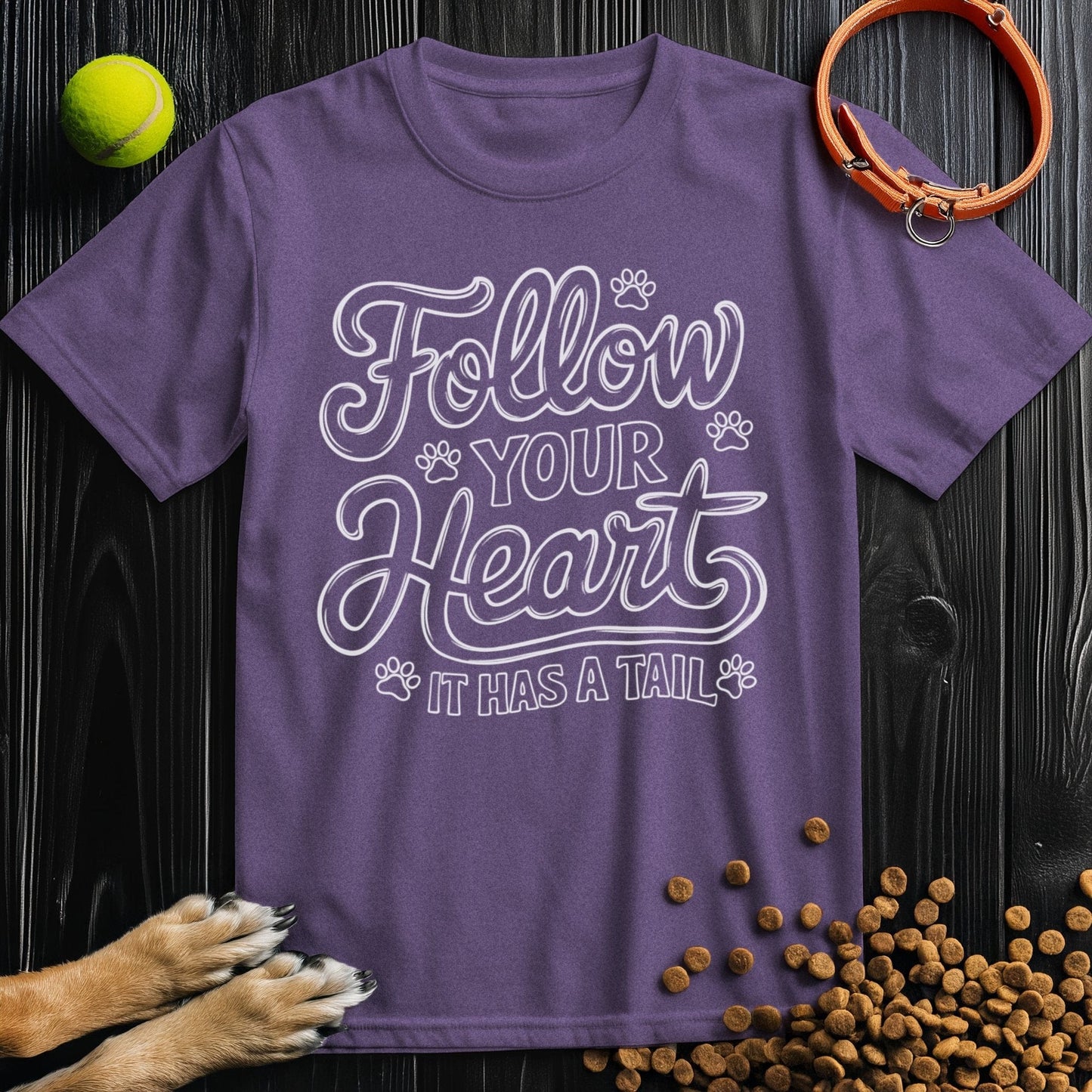 Purple Dog Lover T-Shirt with playful 'Follow Your Heart It Has A Tail' text, crafted from breathable 100% cotton fabric.