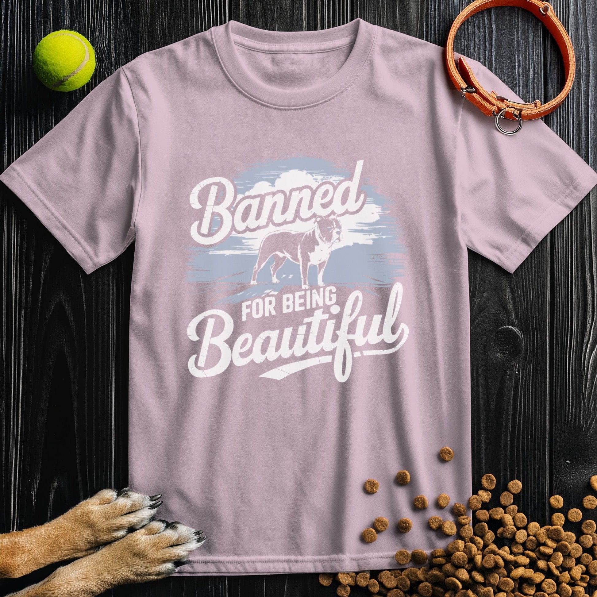 Light pink Banned & Beautiful Pitbull T-Shirt in breathable cotton, unisex crew fit with empowering message and dog illustration.