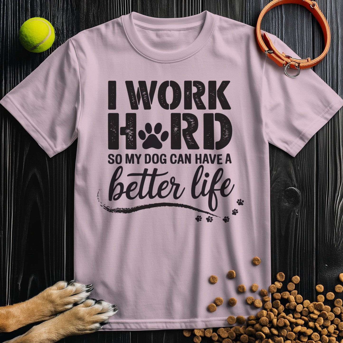 Light pink cotton t-shirt with 'I Work Hard So My Dog Can Have a Better Life' slogan, combining comfort and pet pride in one design.