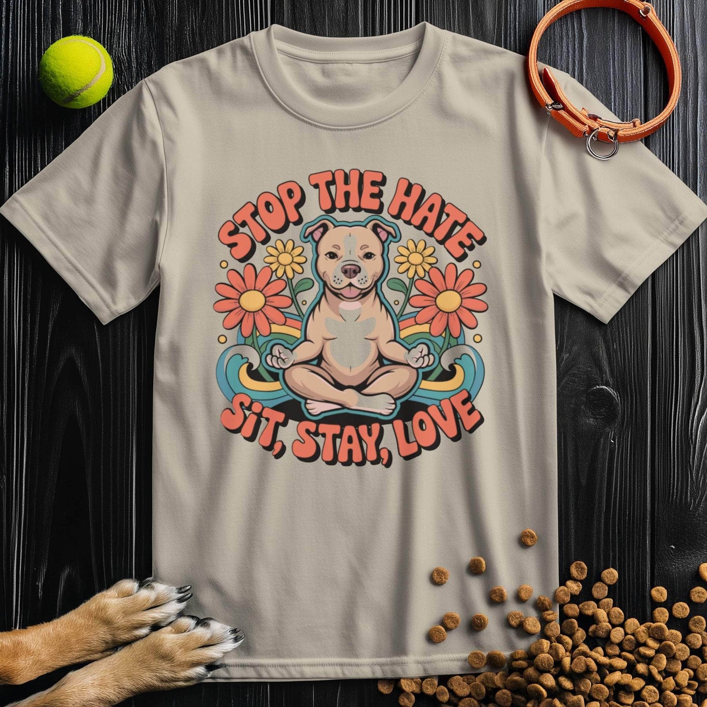 Beige Sit, Stay, Love T-Shirt with colorful dog and flower print. Ethical 100% cotton t-shirt for pet lovers and summer fashion.