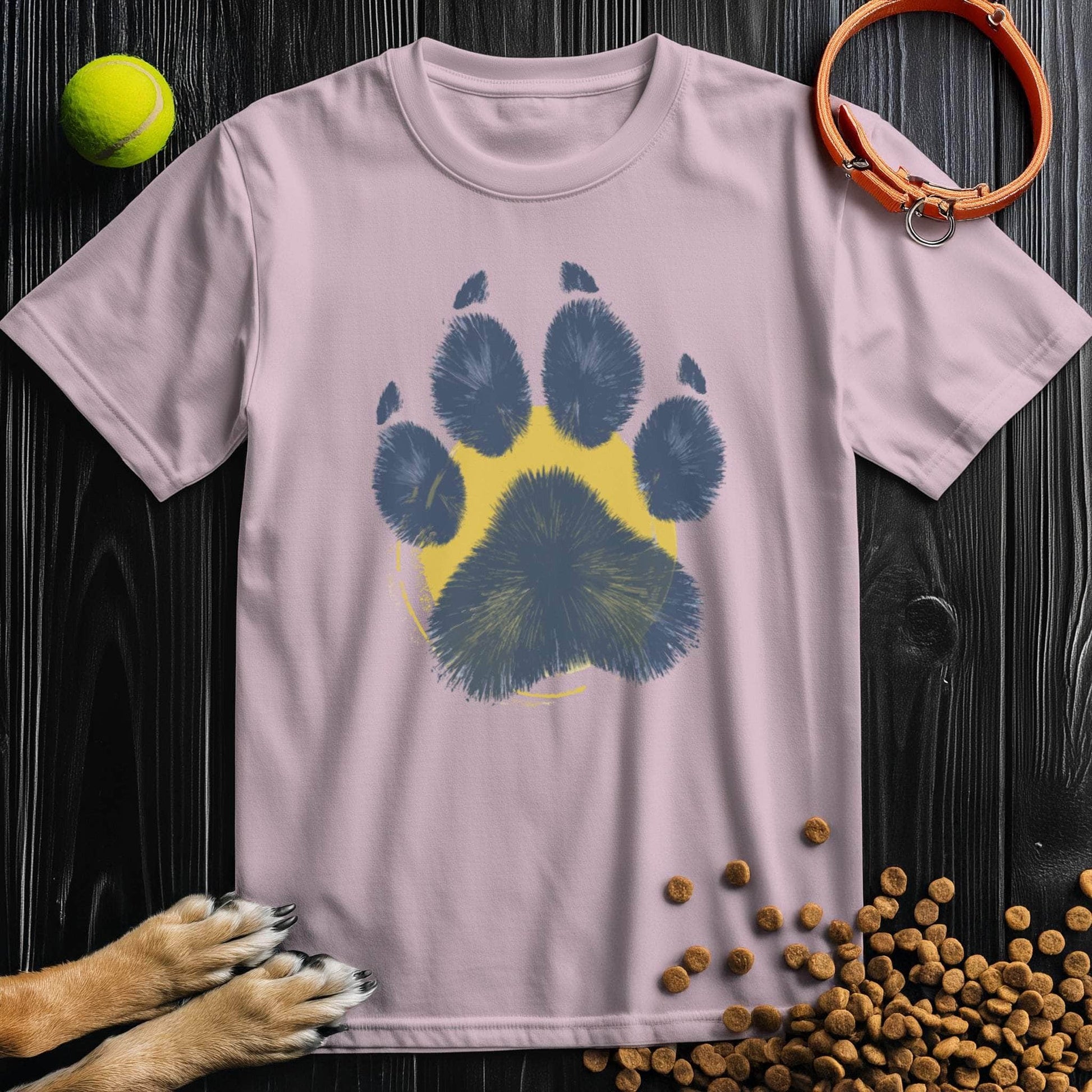 Light pink Painter’s Paw T-Shirt with artistic blue paw print. Unisex 100% cotton tee for dog lovers, ideal for gifting and casual fashion.
