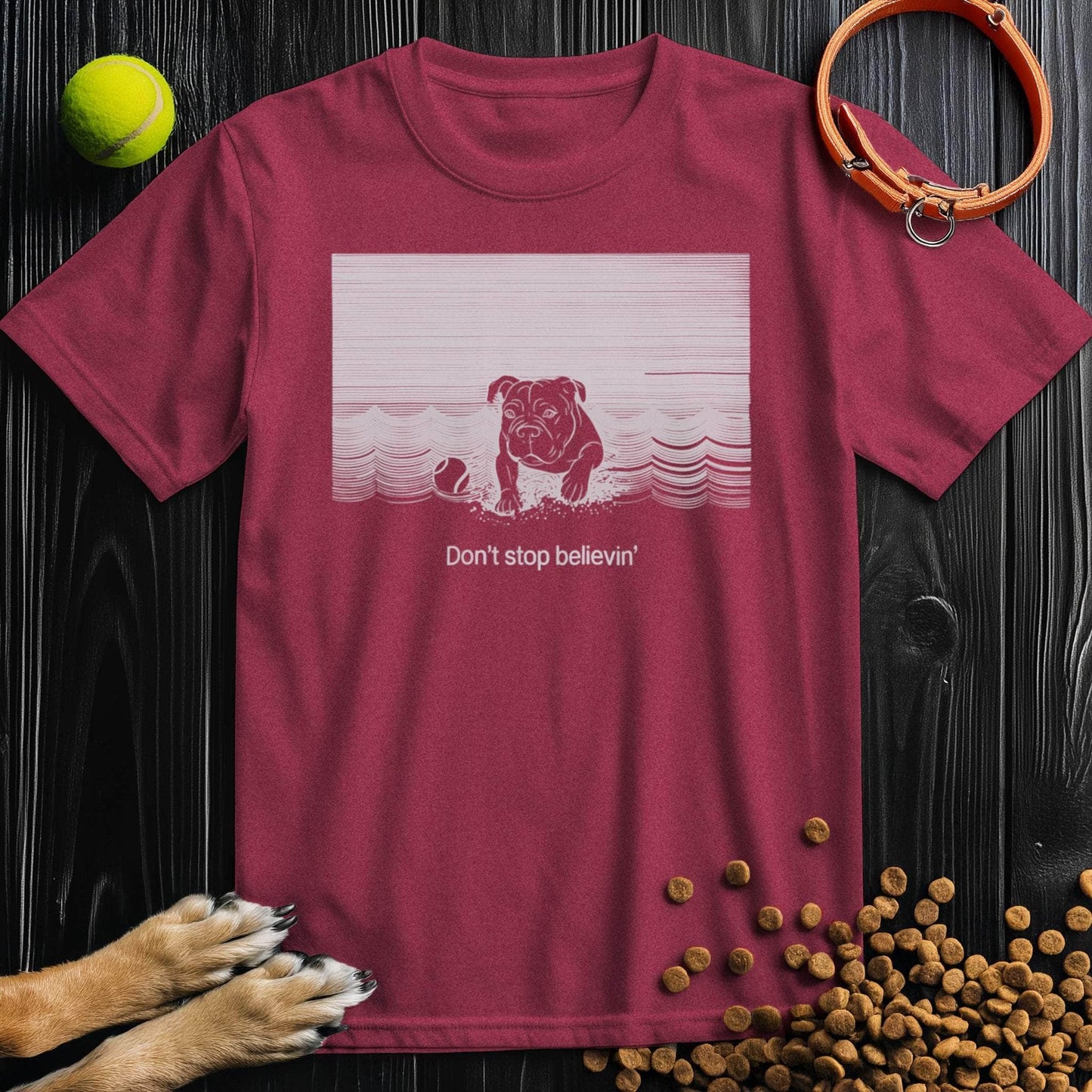 Maroon Dog T-Shirt with a dog in waves and 'Don't Stop Believin' quote. Stylish 100% cotton dog themed shirt for all occasions.