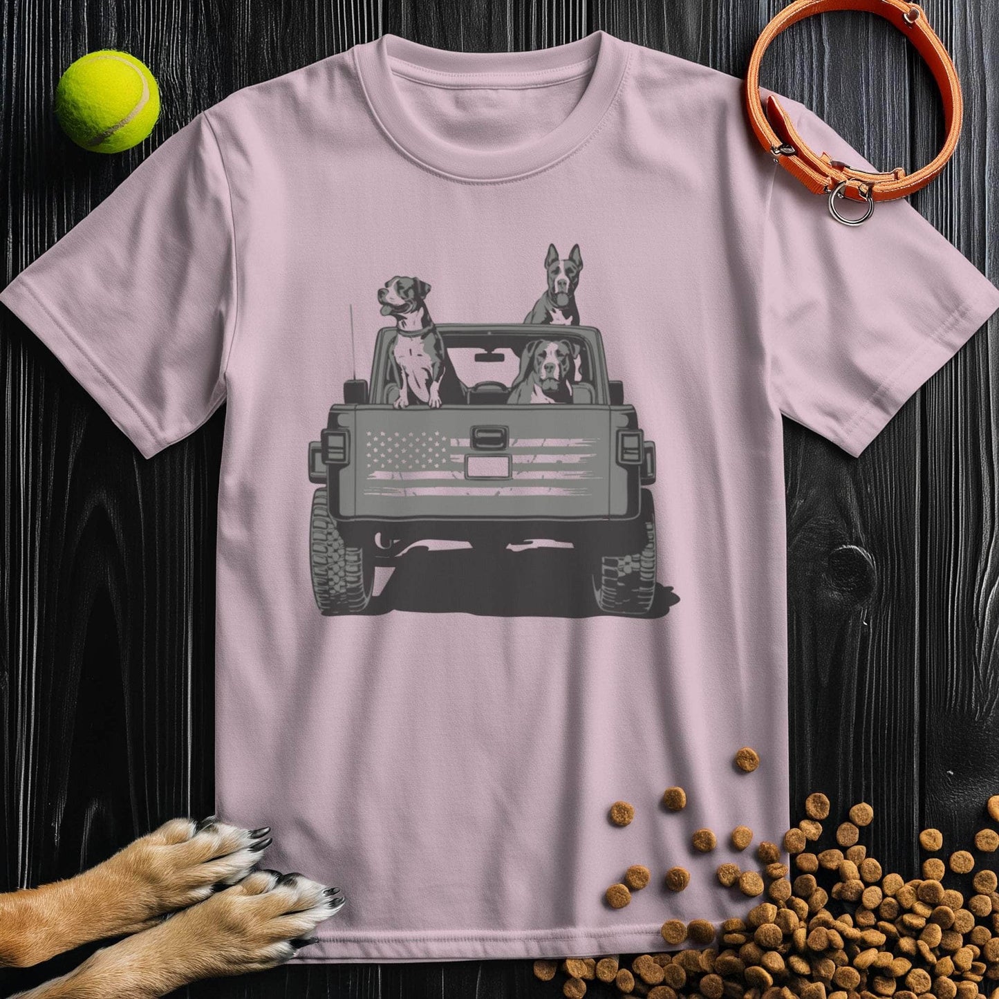 Pink Freedom Ride Dog T-Shirt featuring dogs in a jeep with flag detail. Soft cotton tee combining style and pet-friendly charm.