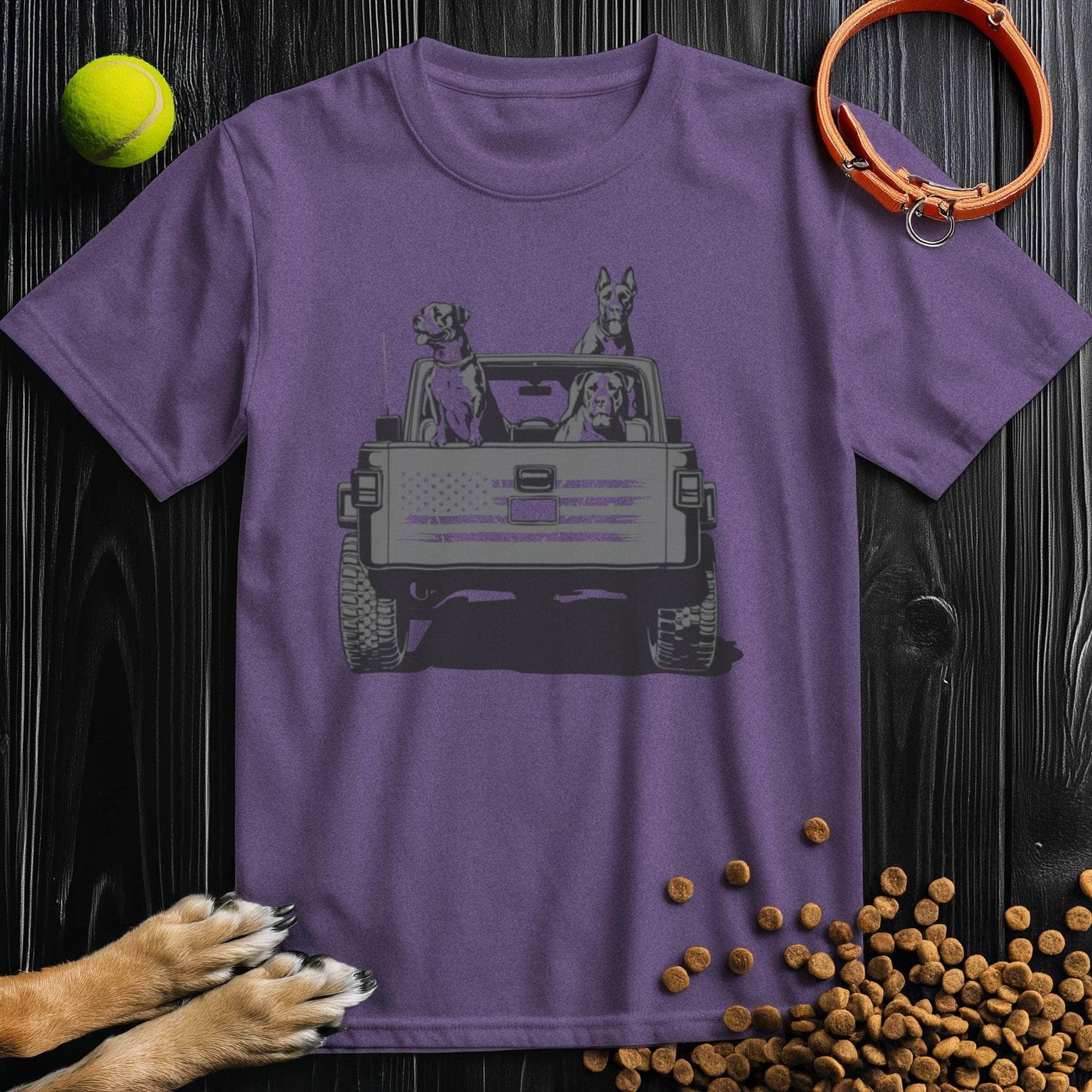 Purple Freedom Ride Dog T-Shirt featuring dogs in a jeep and flag design. Fun and cozy cotton shirt for dog lovers.